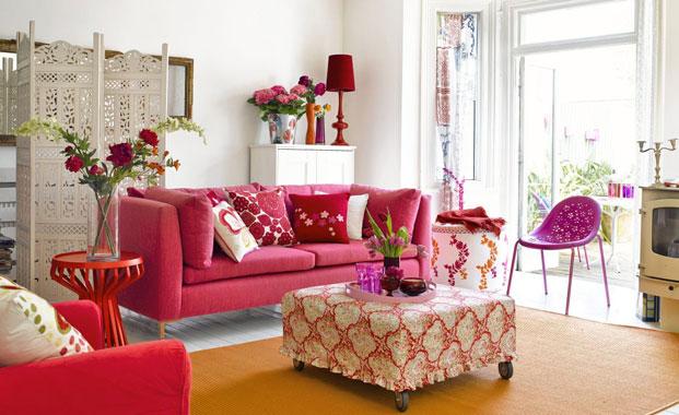 http://sarahbarksdaledesign.files.wordpress.com/2012/02/pink-couch-red-white-shabby-country-urban-home-interior-better-decorating-bible.jpg